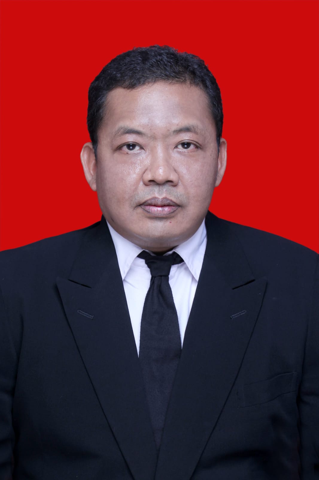 Abdul Malik, S.H.i, M.Ikom